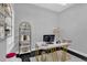Home office with a desk, shelving, and a large window at 2847 Calvano Dr, Land O Lakes, FL 34639