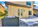 Rear exterior view showcasing a patio and AC units at 2847 Calvano Dr, Land O Lakes, FL 34639