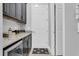 Butler's pantry with wine cooler and additional storage at 2847 Calvano Dr, Land O Lakes, FL 34639