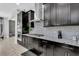 Kitchen with granite countertops and dark cabinetry at 2847 Calvano Dr, Land O Lakes, FL 34639