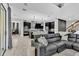 Open concept living room with kitchen and dining area views at 2847 Calvano Dr, Land O Lakes, FL 34639