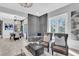 Cozy sitting area with tufted wall and comfortable armchairs at 2847 Calvano Dr, Land O Lakes, FL 34639