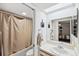 Clean bathroom with updated vanity and shower at 2902 Oak Cir, Tarpon Springs, FL 34689