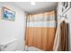 Simple bathroom with shower/tub combo and updated fixtures at 2902 Oak Cir, Tarpon Springs, FL 34689