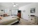 Comfortable bedroom with ceiling fan and neutral decor at 2902 Oak Cir, Tarpon Springs, FL 34689