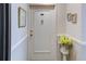 Apartment entrance showing the front door, and a small table with flowers at 30 Turner St # 201, Clearwater, FL 33756