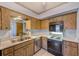 Functional kitchen featuring stainless steel appliances and ample counter space at 30 Turner St # 201, Clearwater, FL 33756