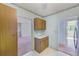 A kitchen area with wood cabinets at 30 Turner St # 201, Clearwater, FL 33756