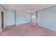 Bright living room featuring a large window and neutral walls at 30 Turner St # 201, Clearwater, FL 33756