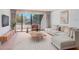 Spacious living room with large windows and comfortable seating at 30 Turner St # 201, Clearwater, FL 33756