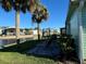Backyard patio with seating area overlooking a canal at 35127 Danny Dr, Zephyrhills, FL 33541