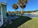 Backyard patio with seating area overlooking a canal at 35127 Danny Dr, Zephyrhills, FL 33541