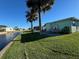 Backyard patio with seating area overlooking a canal at 35127 Danny Dr, Zephyrhills, FL 33541