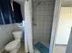 Simple bathroom with a shower stall and toilet at 35127 Danny Dr, Zephyrhills, FL 33541