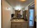 Bathroom with vanity and medicine cabinet at 35127 Danny Dr, Zephyrhills, FL 33541