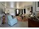 Relaxing living room with comfy seating and a view of the canal from sliding doors at 35127 Danny Dr, Zephyrhills, FL 33541