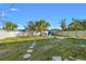 Large backyard with stone path and mature trees at 3637 63Rd N St, St Petersburg, FL 33710