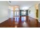 Bright and airy living room with hardwood floors and high ceilings at 4076 Breckland Ct, Spring Hill, FL 34609