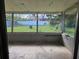 Sunroom with view of backyard at 4612 Eastwood Ln, Holiday, FL 34690