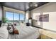 Main bedroom with large windows, city views, and stylish decor at 5120 Marina Way # 16002, Tampa, FL 33611