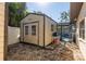 Tan storage shed with double doors, great for extra storage at 635 Hudson Ave, Tampa, FL 33606