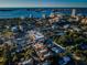 Aerial view of coastal city, featuring waterfront, bridges, and buildings at 643 Blue Taverna Ln, Clearwater, FL 33756