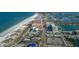 Aerial view of beach, ocean, and hotels at 643 Blue Taverna Ln, Clearwater, FL 33756