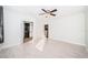 Bedroom with walk-in closet and wood floors at 643 Blue Taverna Ln, Clearwater, FL 33756