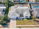Property overview showing the house and surrounding area at 8015 Idlebriar Ln, Port Richey, FL 34668