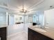 Spacious bathroom with double vanity and plenty of light at 8015 Idlebriar Ln, Port Richey, FL 34668