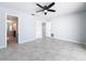 Bedroom with access to bathroom and other rooms at 8015 Idlebriar Ln, Port Richey, FL 34668