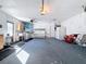 Large garage, offering extra storage and a workshop area at 8015 Idlebriar Ln, Port Richey, FL 34668
