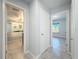Bright hallway with access to bedrooms and bathroom at 8015 Idlebriar Ln, Port Richey, FL 34668