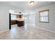 Kitchen features dark wood cabinets and an island at 8015 Idlebriar Ln, Port Richey, FL 34668