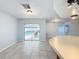 Kitchen with breakfast bar and access to the pool area at 8015 Idlebriar Ln, Port Richey, FL 34668