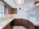 Kitchen with a breakfast bar and view of the pool at 8015 Idlebriar Ln, Port Richey, FL 34668