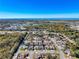 Wide aerial view of the neighborhood and surrounding area at 8015 Idlebriar Ln, Port Richey, FL 34668
