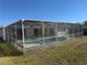 Screened pool and patio area, perfect for outdoor enjoyment at 8015 Idlebriar Ln, Port Richey, FL 34668