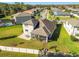 Aerial view of house, backyard and neighborhood at 8144 Sequester Loop, Land O Lakes, FL 34637