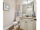 Clean bathroom with granite countertop and updated fixtures at 8144 Sequester Loop, Land O Lakes, FL 34637