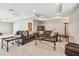 Bonus room features leather furniture and a cozy atmosphere at 8144 Sequester Loop, Land O Lakes, FL 34637