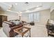 Bonus room with comfortable seating, large windows and plenty of natural light at 8144 Sequester Loop, Land O Lakes, FL 34637