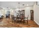 Dining room with hardwood floors, chandelier, and built-in hutch at 8144 Sequester Loop, Land O Lakes, FL 34637