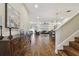 Hardwood entry hall with views of living and dining areas at 8144 Sequester Loop, Land O Lakes, FL 34637