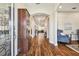 Bright and spacious entryway with hardwood floors and access to living areas at 8144 Sequester Loop, Land O Lakes, FL 34637