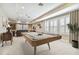 Game room featuring a pool table, comfortable seating, and large windows at 8144 Sequester Loop, Land O Lakes, FL 34637