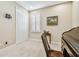 Bright home office with a rolltop desk and window with shutters at 8144 Sequester Loop, Land O Lakes, FL 34637