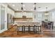 Island kitchen with granite countertops and stainless steel appliances at 8144 Sequester Loop, Land O Lakes, FL 34637