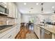 Modern kitchen with granite countertops and stainless steel appliances at 8144 Sequester Loop, Land O Lakes, FL 34637