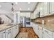 Eat-in kitchen with granite countertops and stainless steel appliances at 8144 Sequester Loop, Land O Lakes, FL 34637